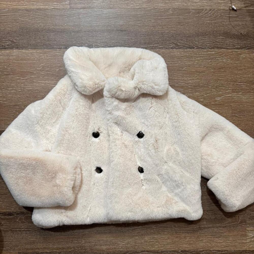 Cream faux fur coat
